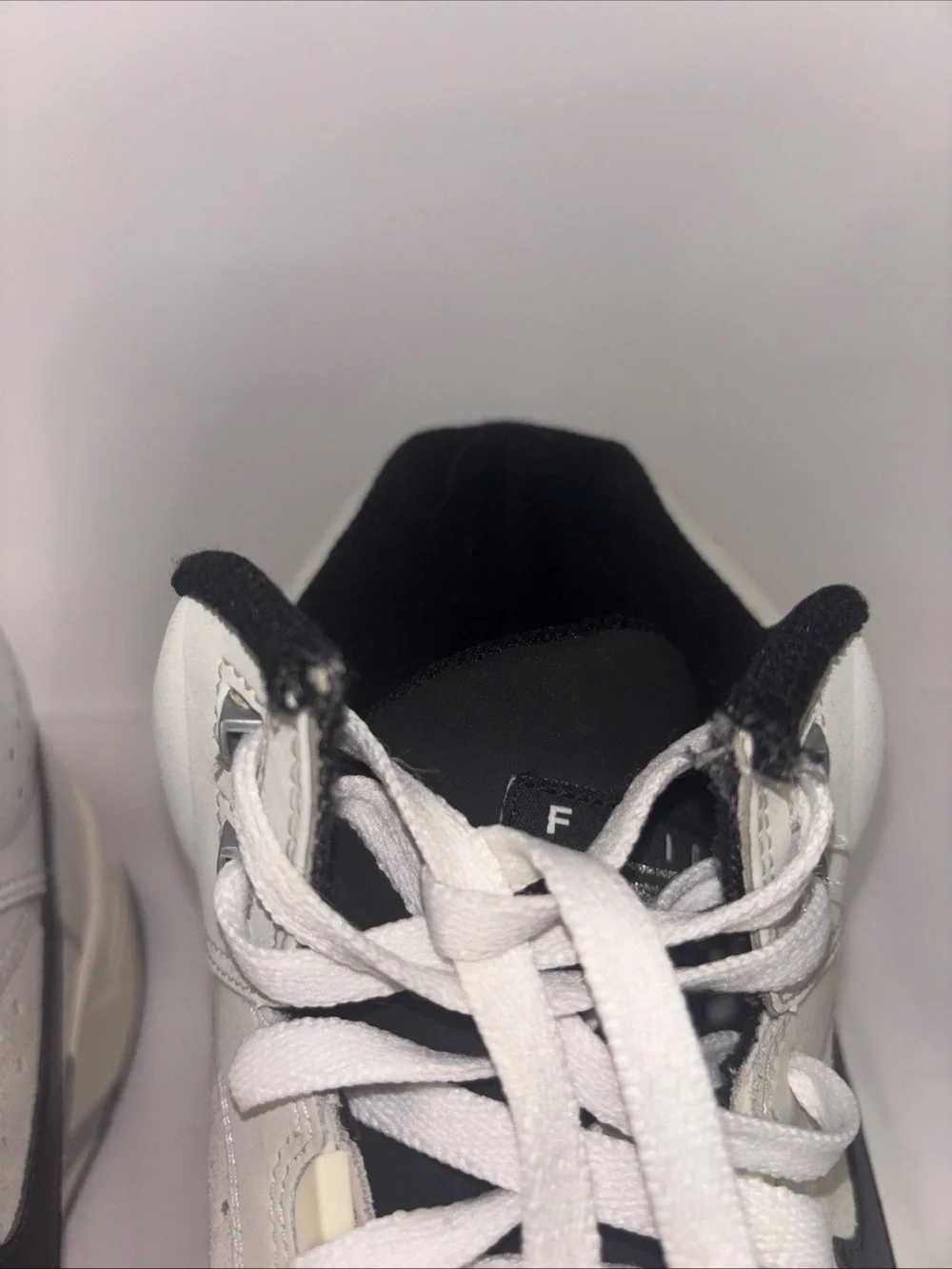 Size 15 Nike Men’s Gray and Black High-Top Sneakers
